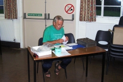 4-Sep-2005 at 06:32 : Meriden Village Hall : Bob Carey checking the records