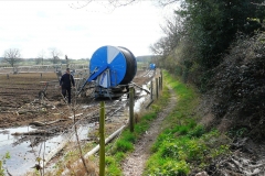 ACW Challenge : 5-Apr-2009 : Just after Tamara Lodge. The field waterer in the distance had failed permanently soaking the path; the nearest field waterer failed as well, but did report to maintenance team who arrived to make the path