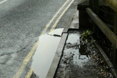 09:01 : The Bridge where Common Lane crossed Finham Brook.  "DO NOT CROSS ROAD Turn right and with care Cross Bridge"